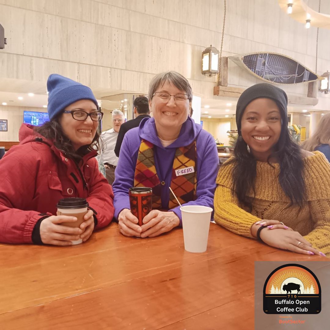 Three members of the BOCC community having coffee at a table