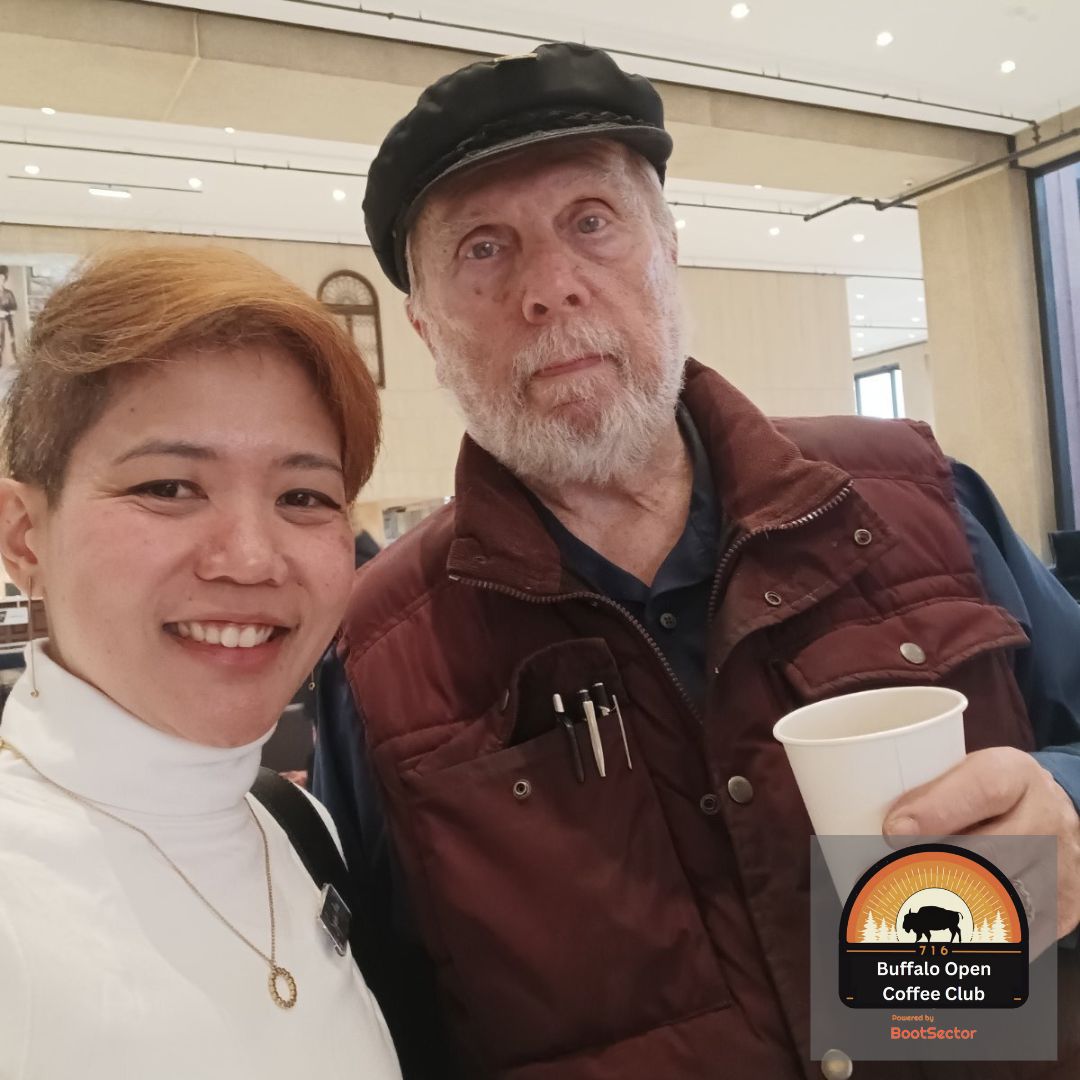 Two BOCC members share a cup